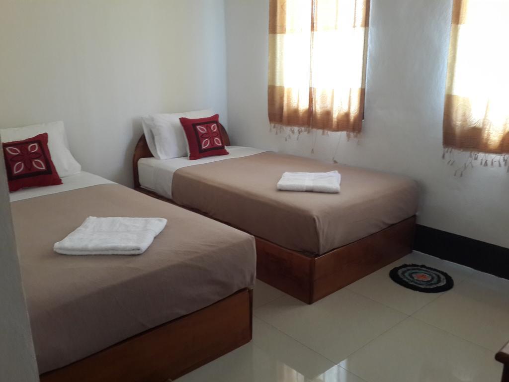 A Tee Guesthouse Luang Prabang Rum bild